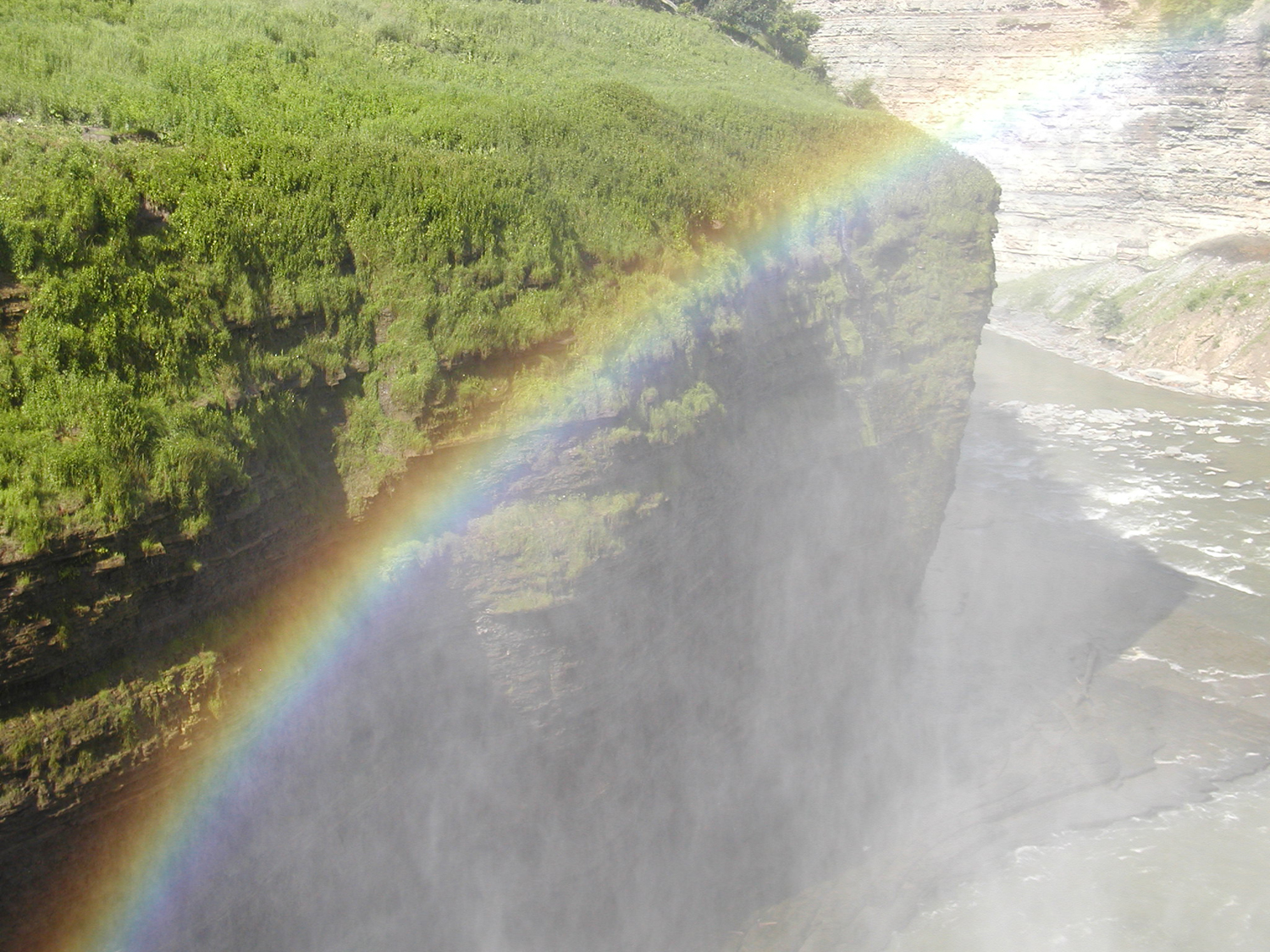 Rainbow in front of the mist from waterfalls